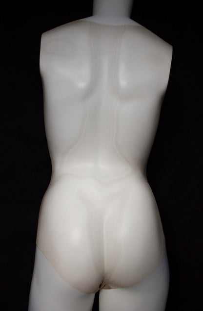 Mannequin torso on a black background