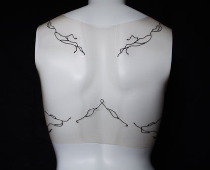 Mannequin with black wire body art on a black background